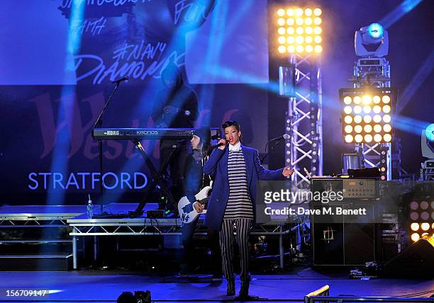 Singer Rihanna performs after switching on the Christmas lights at Westfield Stratford City with young ambassadors from Save The Children,...