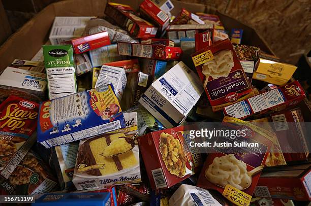 Boxes of donated food sit in a container at the Bay Area Rescue Mission on November 19, 2012 in Richmond, California. Days ahead of Thanksgiving, the...