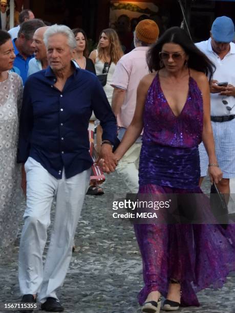 Michael Douglas and Catherine Zeta-Jones are seen out for a walking on July 31, 2023 in Portofino, Italy.