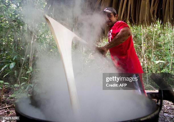 The 'chiclero' Alfredo Rodriguez cooks the latex of the chicozapote tree to make the base of gum used for organic chewing gum, in the jungle of Tres...