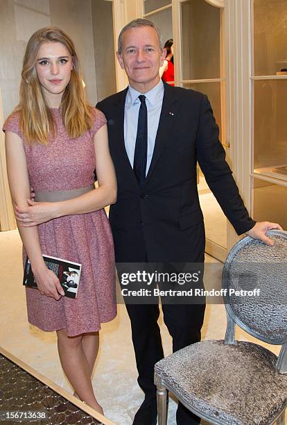 Gaia Weiss and Francis Huster attend the signing of Huster's book "And Dior Created Woman" at Dior Boutique on November 19, 2012 in Paris, France.