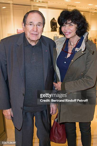 Robert Hossein and Baroness Paul Hottinguer attend the signing of Francis Huster's book "And Dior Created Woman" at Dior Boutique on November 19,...
