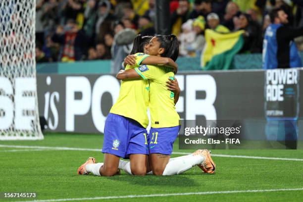 Ary Borges of Brazil celebrates with teammate Adriana after scoring her team's first goal during the FIFA Women's World Cup Australia & New Zealand...