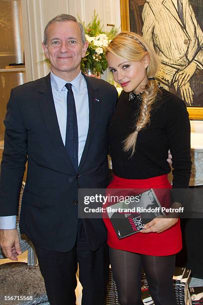 Beatrice Rosen and Francis Huster attend the signing of Huster's book "And Dior Created Woman" at Dior Boutique on November 19, 2012 in Paris, France.