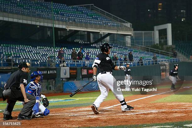 Boss Moanaroa of Team New Zealand hits a two run RBI single in the top of the fifth inning during Game 5 of the 2013 World Baseball Classic Qualifier...