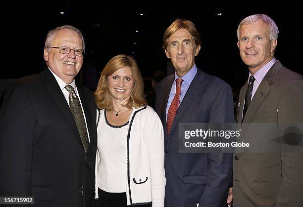 Left to right, Jim McCarthy, President of Suffolk University, Tara Taylor, of North Reading, John Nucci, of East Boston, and Leo Corcoran, of Boston,...