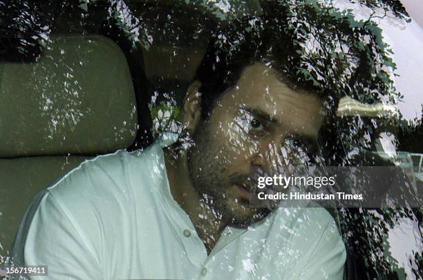 Congress Party General Secretary and member Lok Sabha Rahul Gandhi, leave attending the first day of the Parliament Monsoon on August 8, 2012 in New...