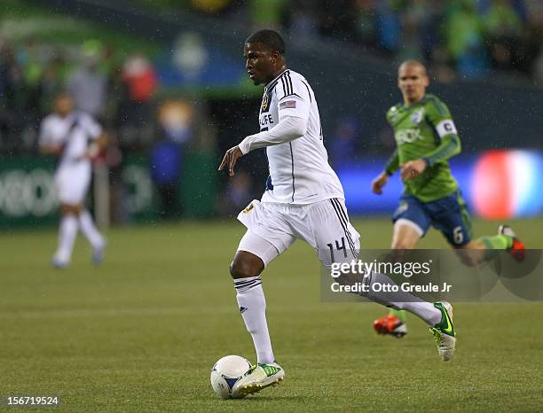 Edson Buddle of the Los Angeles Galaxy dribbles against the Seattle Sounders FC during Leg 2 of the Western Conference Championship at CenturyLink...