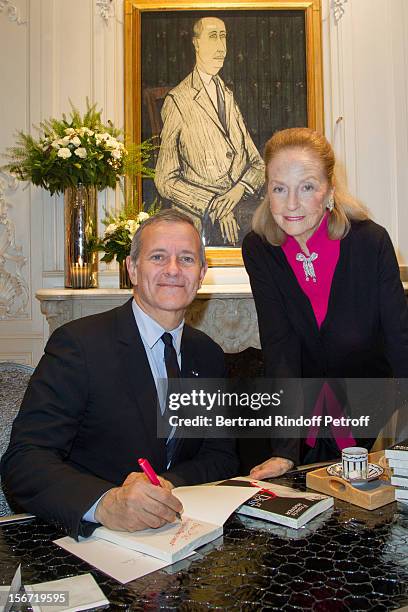 Doris Brynner and Francis Huster attend the signing of Francis Huster's book "And Dior Created Woman" at Dior Boutique on November 19, 2012 in Paris,...