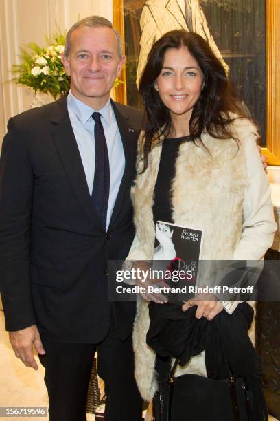 Cristiana Reali and Francis Huster attend the signing of Huster's book "And Dior Created Woman" at Dior Boutique on November 19, 2012 in Paris,...