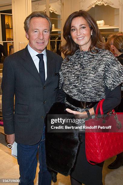 Belgian fashion designer Edouard Vermeulen and Katia Toledano, the wife of Sidney Toledano, CEO of Christian Dior, attend the signing of Francis...