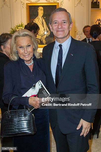 Micheline Maus and Francis Huster attend the signing of Francis Huster's book "And Dior Created Woman" at Dior Boutique on November 19, 2012 in...