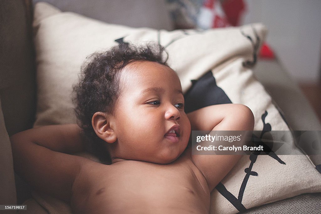 Lounging toddler boy