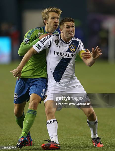 Robbie Keane of the Los Angeles Galaxy battles Adam Johansson of the Seattle Sounders FC during Leg 2 of the Western Conference Championship at...