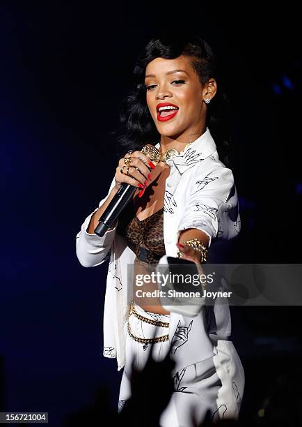 Singer Rihanna gives away a personalised HTC phone live on stage as part of her 777 tour at The Forum on November 19, 2012 in London, England.