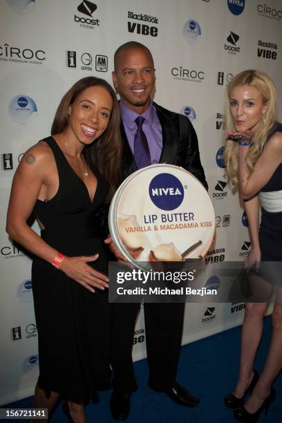 Spokesmodel Samantha Clayton, Basketball player Royce Clayton, and Nivea model attend on November 18, 2012 in Los Angeles, California.