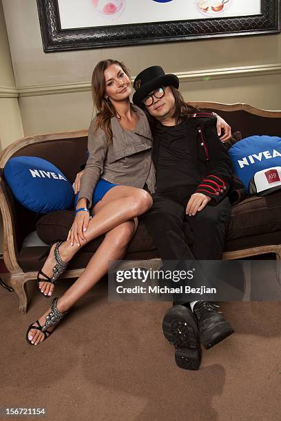 Model Julia Lacour and Wayne Kao attend on November 18, 2012 in Los Angeles, California.