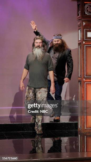 Episode 4355 -- Pictured: Willie and Phil Robertson arrive on November 19, 2012 --