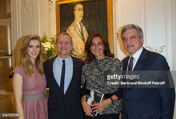 Gaia Weiss, Francis Huster, Katia Toledano and her husband Sidney Toledano, CEO of Christian Dior, attend the signing of Huster's book "And Dior...