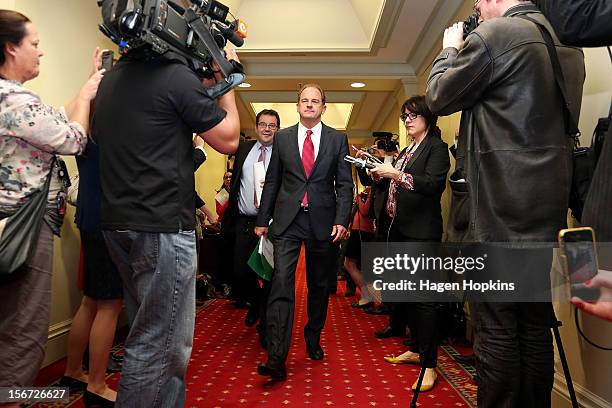 Labour leader David Shearer and deputy leader Grant Robertson pass through waiting media on their way to the caucus room at Parliament on November...