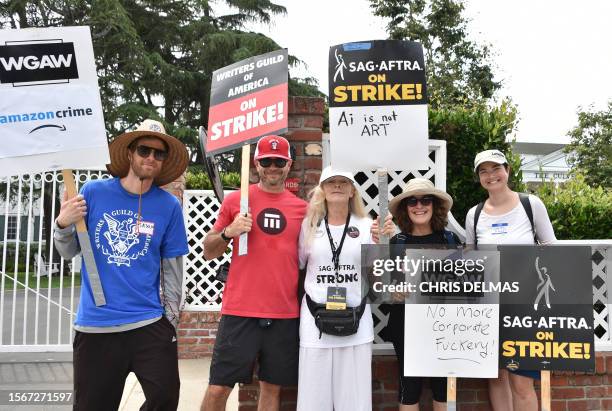 Screenwriter Damon Lindelof and US actress Frances Fisher join members of the Writers Guild of America and the Screen Actors Guild as they walk the...