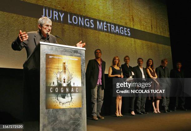 French director Claude Lelouch , who heads the 25th Cognac international thriller and film noir festival, addresses the audience, flanked by the...
