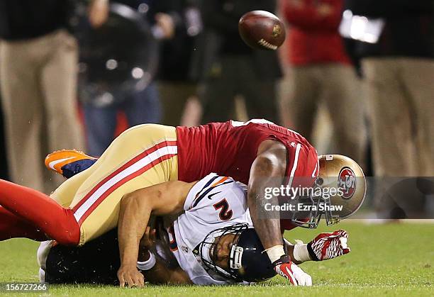 Jason Campbell of the Chicago Bears fumbles the ball as he is sacked by Ahmad Brooks of the San Francisco 49ers in the third quarter of the game at...