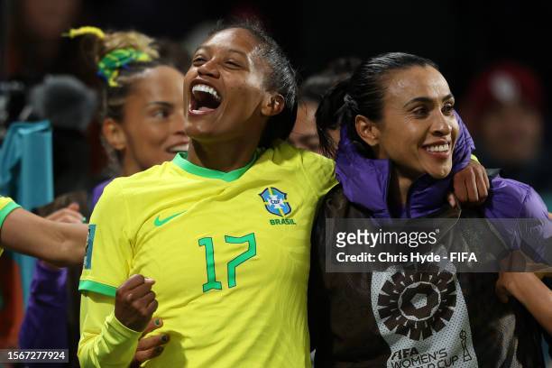 Ary Borges of Brazil celebrates with teammate Marta after scoring her team's fourth and her hat trick goal during the FIFA Women's World Cup...