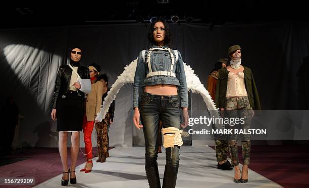 Models display various costumes during the "Toxic Threads - The Big Fashion Stitch-up" fashion parade organized by environment action group...