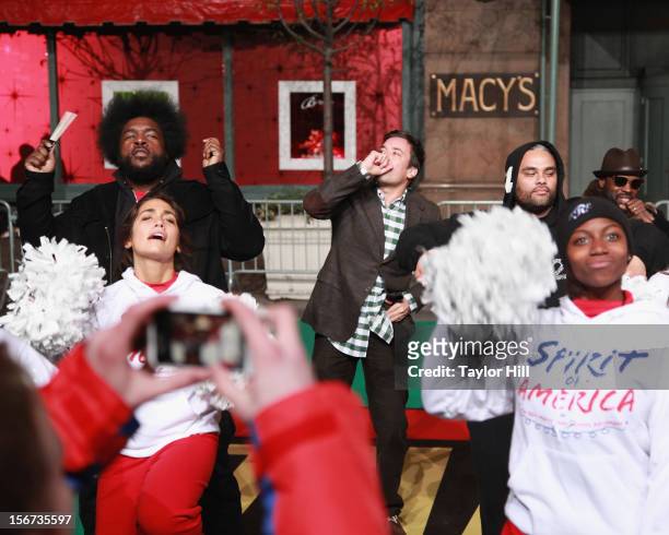 Ahmir "?Questlove" Thompson, Jimmy Fallon, and Black Thought perform with Spirit of America cheerleaders perform at Day One of the 86th Anniversary...