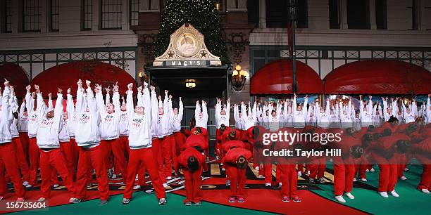 Spirit of America cheerleaders perform at Day One of the 86th Anniversary Macy's Thanksgiving Day Parade Rehearsals at Macy's Herald Square on...