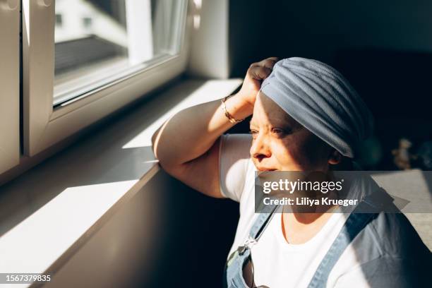 lonely desperate woman with cancer. - chemotherapy drug stock pictures, royalty-free photos & images