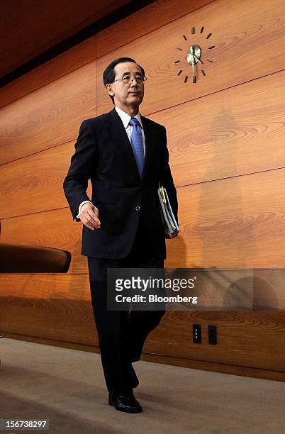 Masaaki Shirakawa, governor of the Bank of Japan, leaves a news conference in Tokyo, Japan, on Tuesday, Nov. 20, 2012. Shirakawa pushed back against...