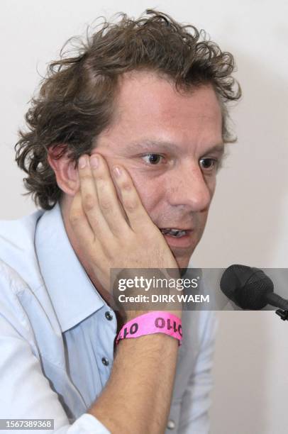 Tom Barman, leader of the rock group Deus, talks to the press during the "0110" charity concert for tolerance and against racism, 01 October 2006 in...