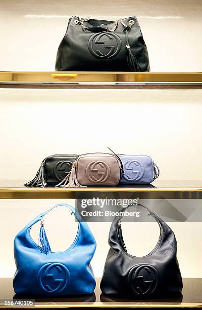 Gucci 'Soho' ladies handbags bearing the interlocking "G" logo sit displayed for sale inside a Gucci store, a luxury unit of France's PPR SA, in...