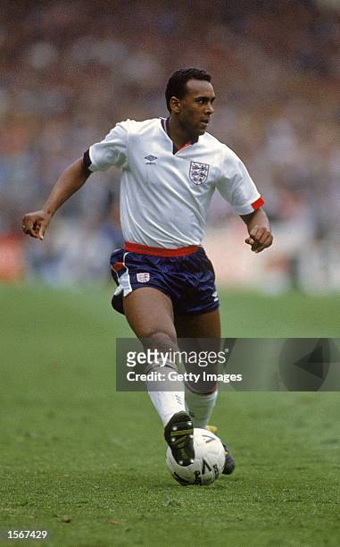 David Rocastle of England runs with the ball during the World Cup 1990 Qualifying match against Poland played at Wembley Stadium, in London. England...