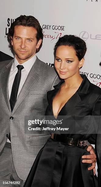 Bradley Cooper and Jennifer Lawrence at the Academy of Motion Picture Arts and Sciences on November 19, 2012 in Beverly Hills, California.