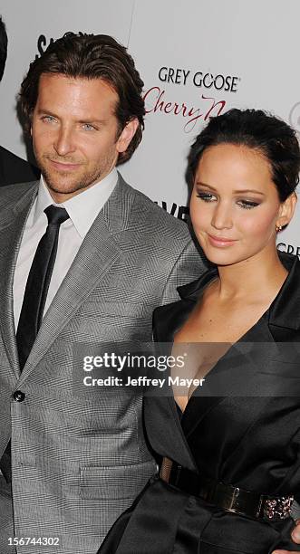 Bradley Cooper and Jennifer Lawrence at the Academy of Motion Picture Arts and Sciences on November 19, 2012 in Beverly Hills, California.