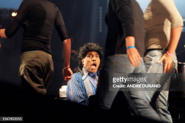 Rock legend Little Richard performs on the stage of the Terre Neuvas festival, 08 July 2006 in Bobital, western France. AFP PHOTO ANDRE DURAND