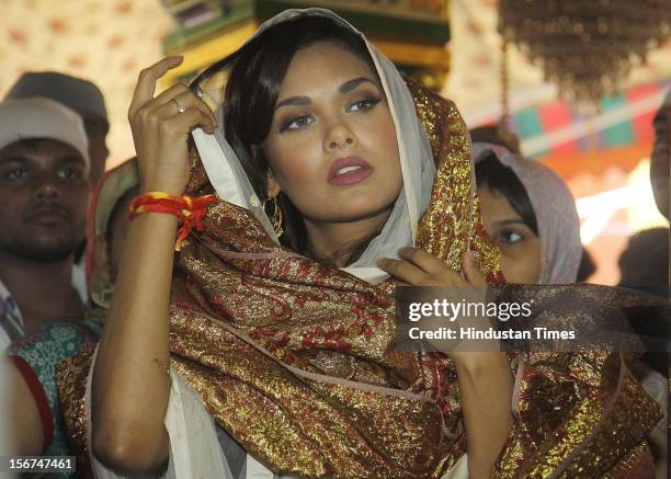 Film Star Esha Gupta visits the Nizamuddin Dargah to offer her prayers for the upcoming Film Raaz 3 on September 4, 2012 in New Delhi, India. "