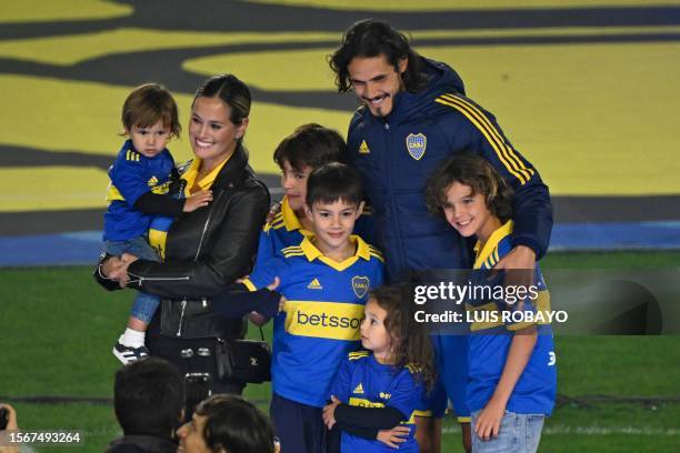 Boca Juniors' new player, Uruguayan forward Edinson Cavani, poses for a picture next to his wife Jocelyn Burgardt and his children during his...