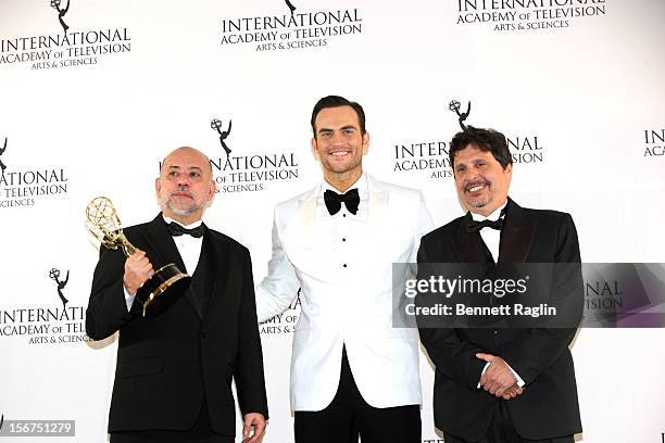 Director Claudio Torres, actor Cheyenne Jackson, and writer Mauro Wilson attend the 40th Annual International Emmy Awards at the Hilton New York on...