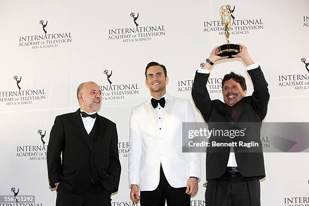 Director Claudio Torres, actor Cheyenne Jackson, and writer Mauro Wilson attend the 40th Annual International Emmy Awards at the Hilton New York on...