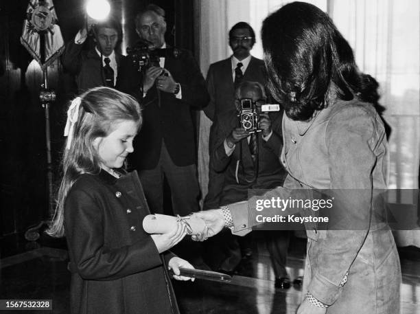 Spanish Royal Infanta Dona Elena of Spain is presented with a scroll as she is made the Patroness of Air Controllers during a reception at the Air...