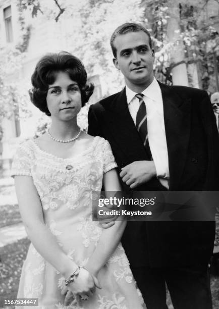 Greek Royal Princess Sophia of Greece and Denmark, and Spanish Royal Juan Carlos, Prince of Asturias, his arm in a sling after a horse riding...