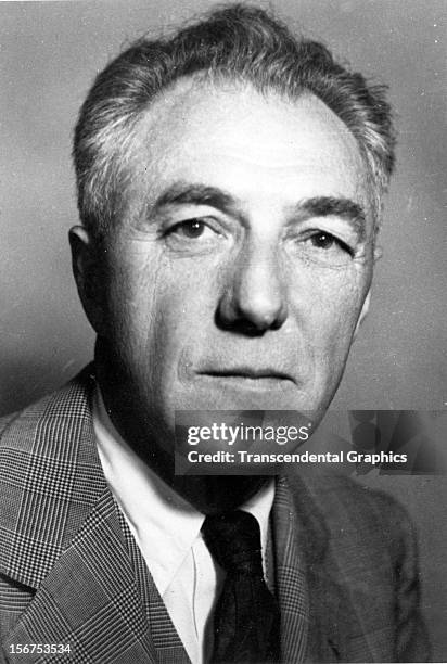 Ford Frick, major league baseball commissioner, center, is shown in a portrait taken in 1955 in New York City.