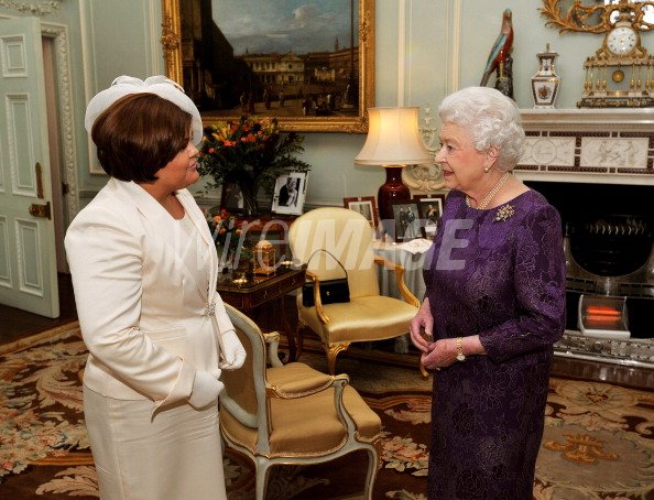 Queen Elizabeth II chats to...
