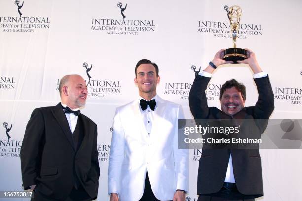 Producer/director Claudio Torres, actor Cheyenne Jackson and writer Mauro Wilson attend the 40th International Emmy Awards at Mercury Ballroom at the...
