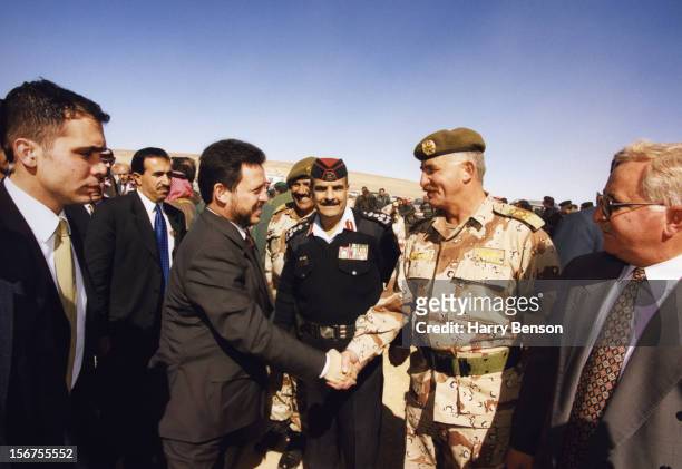 King Abdullah II of Jordan is photographed with army dignitaries for Life Magazine in 2000 in Ma'an, Jordan.