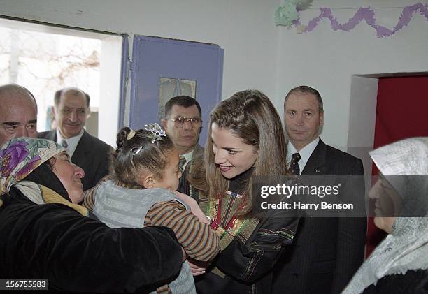 King Abdullah II of Jordan's wife Queen Rania is photographed greeting admirers for Life Magazine in 2000 in Ma'an, Jordan.